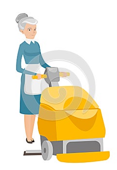Caucasian worker cleaning store floor with machine