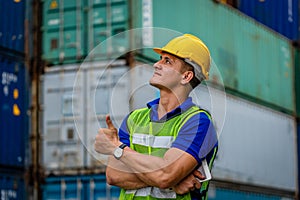 Caucasian worker in safety vest reflective with Safety helmet thumb-up and smile