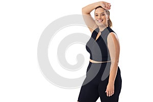 Caucasian young female plus size model on white background, copy space
