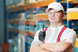 Caucasian young manual worker in warehouse