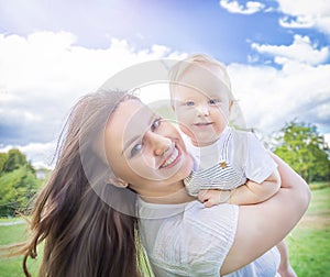 Caucasians happy baby (boy) and his mother. Healthy child (kid) having fun with mom in.