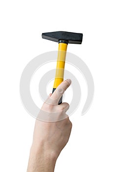 Caucasians man's hand holds hammer. Maintenance concept photo