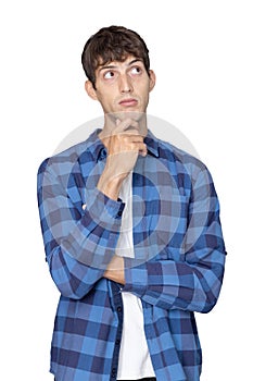 Caucasion Man Thinking While Looks Up to Blank Space with Hand Touching His Chin photo