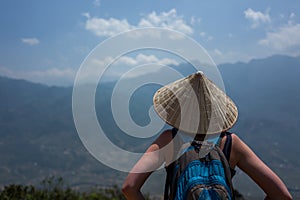 Caucasoan girl enjoys the view near Spa, Vietnam.