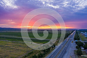 Caucasus highway on a summer evening in the rays of the setting sun