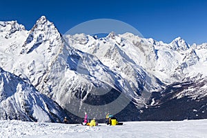 Caucasus Mountains, Panoramic view of the ski slope  on the horizon in winter day. Dombai ski resort, Western Caucasus, Karachai-