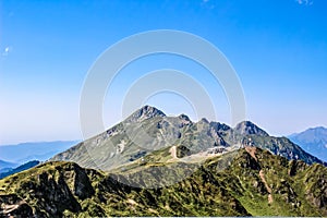 Caucasus Mountains. Russia, Sochi, Krasnaya Polyana, Rosa Khutor. Peak 2320m photo