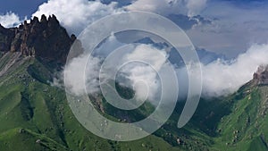 Caucasus mountains under clouds