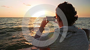 Caucausian Man Photographing Sunrise