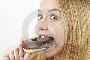 Caught - she eats a donut