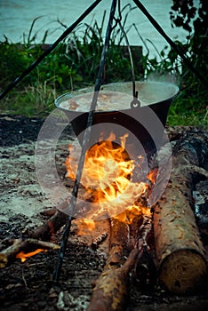 Cauldron with goulash bograch on the fire