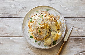 Cauliflower baked in oven with parmesan cheese