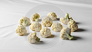 Of the cauliflower, casting soft shadows on the background. The