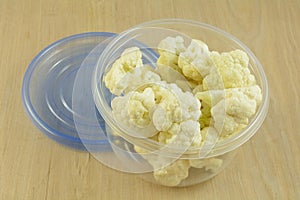 Cauliflower florets in storage container