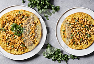 cauliflower tortillas with aloo gobi and chickpeas top view