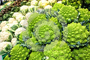 Cauliflower vegetables. Broccoli romanesco and artichokes photo