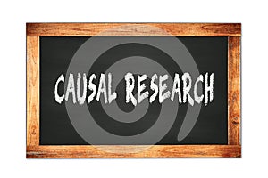 CAUSAL  RESEARCH text written on wooden frame school blackboard