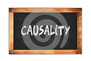 CAUSALITY text written on wooden frame school blackboard photo