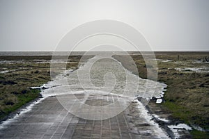 High tide causeway to Mando Island in Denmark. photo