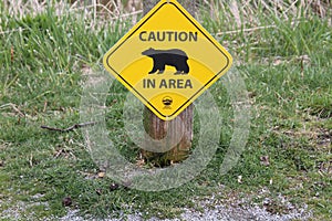 A caution bear in area sign