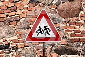 caution children crossing Road sign post mounted