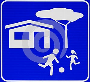 Caution, children at play. Street sign with blue background, no text