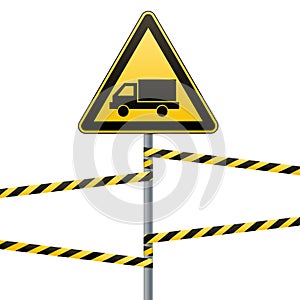 Caution - danger Warning sign safety. Beware of the Car. A yellow triangle with a black image. The sign on the pole and protecting