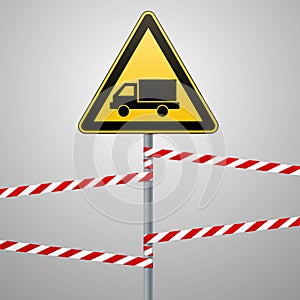 Caution - danger Warning sign safety. Beware of the Car. A yellow triangle with a black image. The sign on the pole and protecting