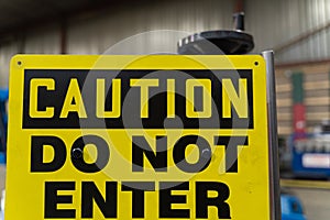 Caution do not enter sign on factory shop floor