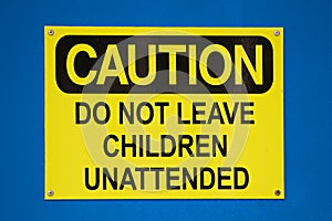 Caution do not leave children sign on a blue background