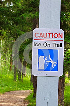 A caution, ice on trail sign