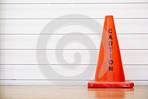 Caution red cone safety notice at workplace office stair photo