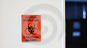 The Caution sign `Biological Hazardâ€ for warning inflected biohazard area, a safety sign warning.
