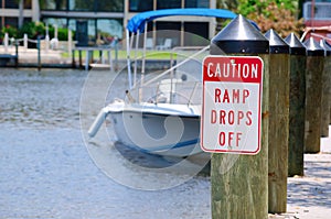 Caution sign at boat ramp