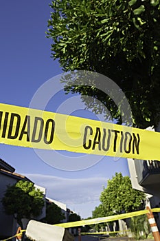 A Caution Sign On The Construction zone against a blurred background.