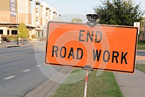 Caution sign, end road work