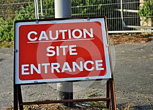 Caution site entrance sign