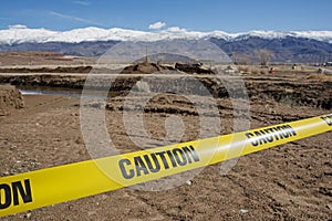 Caution Tape In Front Of Flood Washout