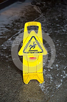 Caution, warning sign, slippery wet floor