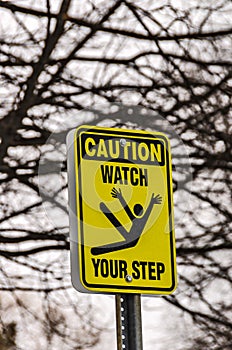 Caution Watch Your Step Sign photo