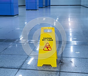 `Caution wet floor` sign