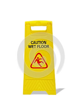 `CAUTION WET FLOOR` warning sign and symbol on yellow cardboard.