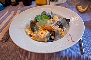 Cavaletti Pasta With Seafood and Mussels Served In A Traditional Italian Restaurant