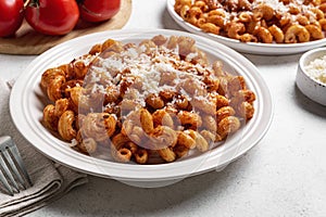 Cavatappi pasta with tomato sauce and parmesan cheese