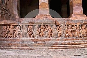 Cave 2 : Facade, Badami Caves, Karnataka, India. Depicting carvings of dwarfish ganas, with bovine and equine heads, in different