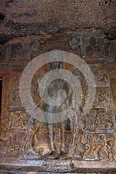 Cave 7, Porch, Astamahabhaya Avalokitesvara left of cave entrance. Aurangabad Caves, Aurangabad