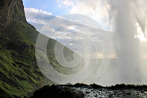 A cave behind the waterfall in Iceland - Seljalandsfoss