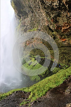 A cave behind the waterfall in Iceland - Seljalandsfoss