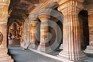 Cave 3 : Carved figures of Vishnu seated on a hooded serpent called Sesha or Ananta on the eastern side of the verandha. Badami Ca photo