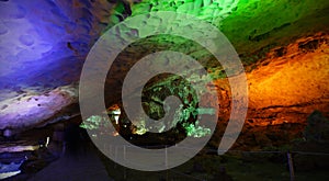 Cave or cavern with colorful lights open for tourism